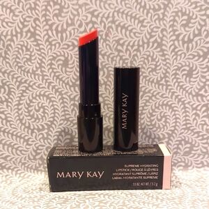 Mary Kay Red Lipstick with Glossy Finish and Sleek Packaging
